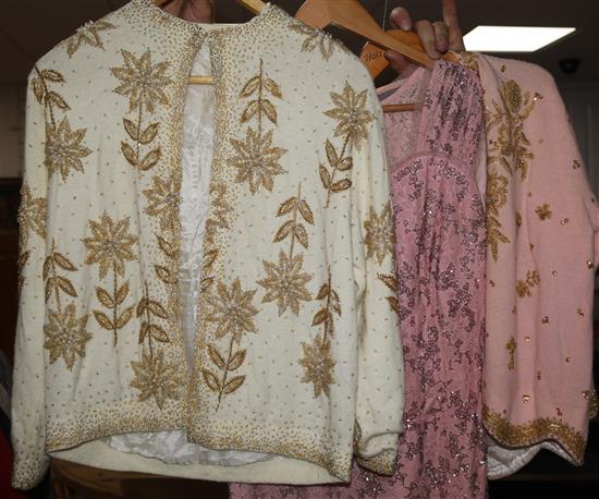 Two 1950s beaded evening cardigans and a pink lace and beaded dress